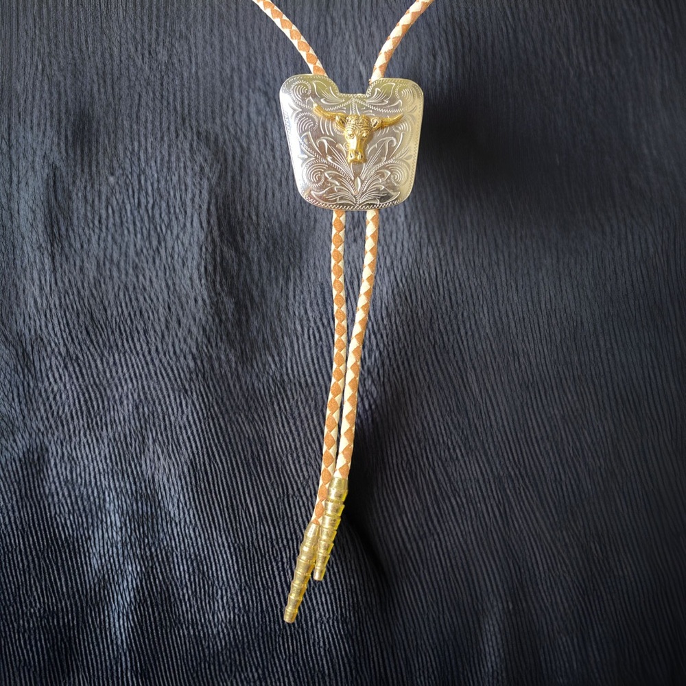 Bolo steer brass on silver